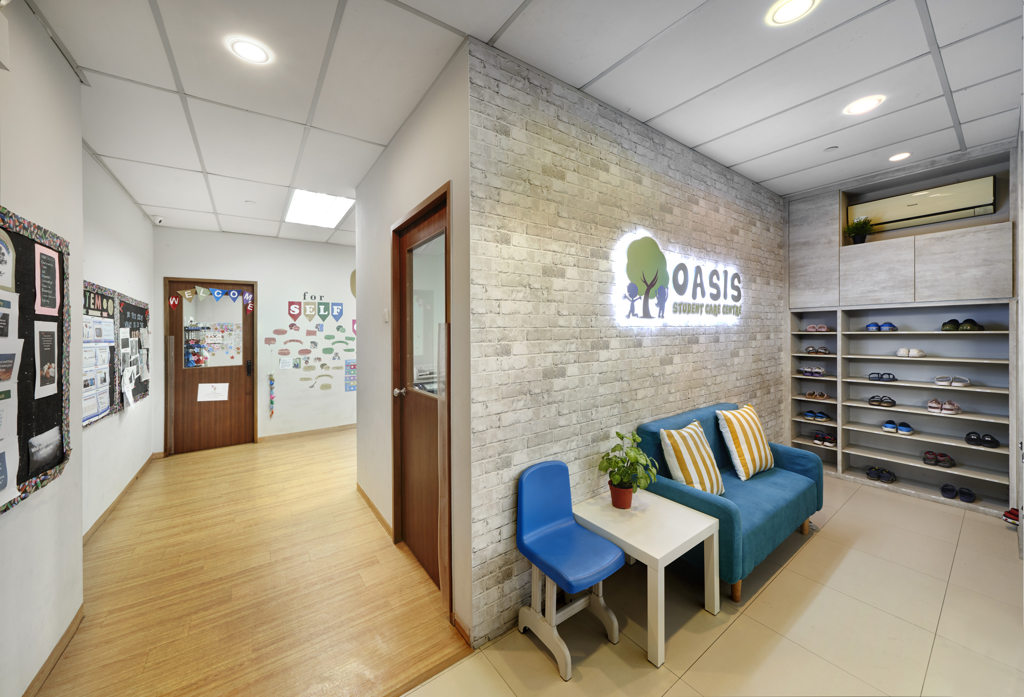 Oasis's welcoming interior, with individual shoe storage and a seating area